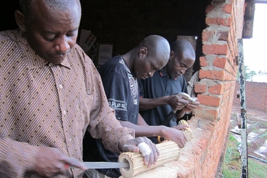 A mango crusher in Chipata, Zambia. As part of a design challenge to get more value from mangos, participants in D-Lab's Creative Capacity Building training session built a device for crushing mangos and extracting the juice. This project was part of a D-Lab trip to establish an Appropriate Technology Center with the Peace Corps in 2011.
