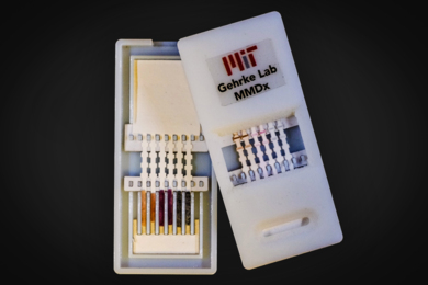 A new paper diagnostic device can detect Ebola as well as other viral hemorrhagic fevers in about 10 minutes. The device (pictured here) has silver nanoparticles of different colors that indicate different diseases. On the left is the unused device, opened to reveal the contents inside. On the right, the device has been used for diagnosis; the colored bands show positive tests.