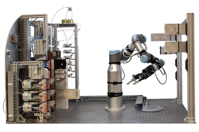 Guided by artificial intelligence and powered by a robotic platform, a system developed by MIT researchers moves a step closer to automating the production of small molecules.