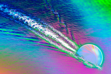 A spherical quark creates a wake as it flows through colorful liquid.