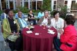 Enjoying the MIT retirement party are (left to right) Janice Phillips, Shirley Phillips, Joseph Melo, Laura Melo and Grace Galton.