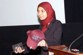 MIT postdoctoral associate Rana el Kaliouby demonstrated wearable  technology she helped develop that may aid people with autism spectrum disorders. The session took place at the Body Sensor Network International Workshop held at MIT April 4 and 5.
