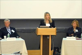 Professor Dava Newman, director of MIT's Technology and Policy
Program, makes introductory remarks at the program's 30th anniversary symposium, held June 8. TPP's founding director, Professor Richard de Neufville, and Institute Professor Sheila Widnall look on.