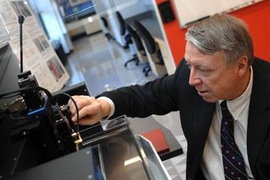 Edwin L. Thomas, head of the Department of Materials Science and Engineering and the Morris Cohen Professor of Materials Science and Engineering, uses a Scanning Acoustic Microscope in MIT's Laboratory for Advanced Materials.