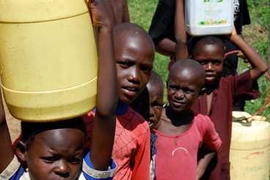 Children collecting water as part of a J-PAL study in western Kenya.