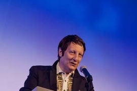 Robert Lepage accepts The Eugene McDermott Award in the Arts at MIT during a gala held in his honor.