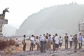 Faculty and students of the MIT Japan Design Workshop at the post-disaster site in July 2011