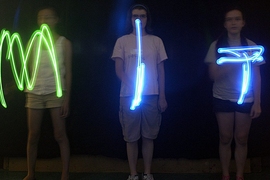 Ninth-grade girls in the Edgerton Center's You GO Girl science and engineering program experimenting with strobe-light photography.