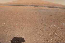 This color panorama shows a view of the landing site of NASA's Curiosity rover, including the highest part of Mount Sharp visible to the rover.