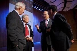 MIT President L. Rafael Reif, second from right, talks with, from left, Magnanti, Moavenzadeh and Crawley after the session.