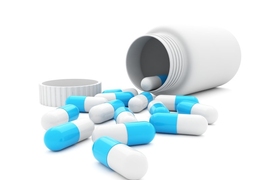 bottle of spilled pills