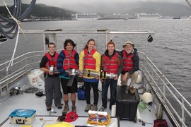 From left to right, Adrian Tanner, David Wise, Jacqueline Sly, Tommy Moriarty and Ed Moriarty (Tommy’s father) hold their underwater glider on the Jack Cotant boat in Ketchikan, Alaska.