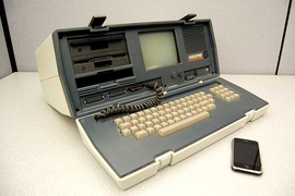 A recent iPhone, right, has thousands of times more computing power than an Osborne Executive "portable" computer from 1982. Such an improvement is an example of Moore's Law in action.
