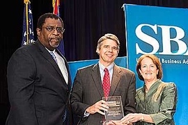 (Editor's note: photo added on Aug. 1, 2013): Eric Evans, director of Lincoln Laboratory, accepts the Eisenhower Award from Calvin Jenkins (left), deputy associate administrator for government contracting and business development, and Karen Mills, administrator, both of the Small Business Administration.