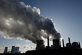 Photo of pollution coming out of two large smokestacks