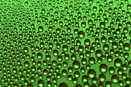 On typical hydrophobic coatings, droplets forming from high-temperature steam soon spread out to coat the surface, quickly degrading their performance. The new coating, seen here, maintains its ability to foster droplet formation over long periods.
