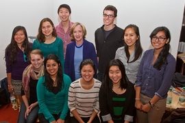 SuperUROP students gather with Susan Hockfield for a group photo. From left (seated): Christy Swartz, Harshini Jayarama, Qui Nguyen, and Michelle Chen; (standing): Angela Zhang, Chelsea Finn, Susan Hockfield, Jennifer Liu and Anvisha Pai; (back row): Francis Chen and Benoit Landry.