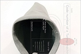 Cover of "Phantasmal Media" book shows hood of gray sweater with table graphics on top.