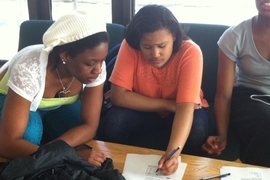 MIT student-mentors help SHINE students through a tailored math curriculum.