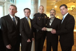 (From left to right) Commissioner William B. Evans, Israel Ruiz, Detective Lt. Christopher Hamilton, John DiFava, and Mayor Marty Walsh.
