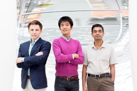 Graduate students Alexandre Cooper-Roy (left), Masashi Hirose (center), and Ashok Ajoy work to harness the quantum properties of matter in MIT's Quantum Engineering Group.