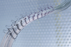 Polymer fibers designed to mimic fibrous geometry of spinal cord nerves