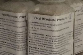 5 labeled bottles of fecal microbiota preparate show lists of text.