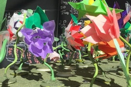 The Robot Garden, displayed at CSAIL, included plastic, illuminating flowers “planted” on a large board that can be controlled via computer. 