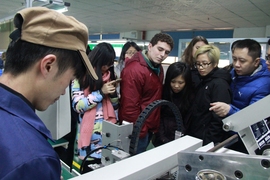 MIT students take a tour of Derneng, a factory located in the Guangdong province, China. 