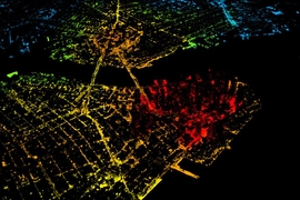 Nighttime image of New York City, with the red showing a large population density. “The adoption potential of electric vehicles is remarkably similar across cities, from dense urban areas like New York, to sprawling cities like Houston. This goes against the view that electric vehicles — at least affordable ones, which have limited range — only really work in dense urban centers,” says Jes...