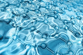 This computational illustration shows a graphene network structure below a layer of water. 