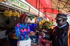 A new study estimates that, since 2008, access to mobile-money services — which allow users to store and exchange monetary values via mobile phone — increased daily per capita consumption levels of 194,000, or roughly 2 percent, of Kenyan households, lifting them out of extreme poverty (living on less than $1.25 per day). 
