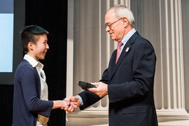 President L. Rafael Reif congratulates MIT senior Lorraine Wong, the 2017 Collier Medal Recipient.