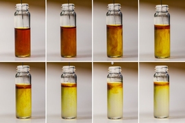 This series of photographs shows the chemical reaction that occurs during the charging of a lithium oxygen battery using lithium iodide as an additive.

