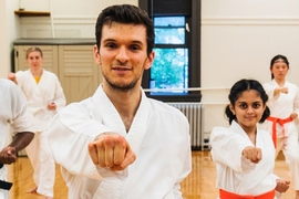 MIT engineering graduate student Vazrik Chiloyan (center) is an instructor for the MIT Shotokan Karate Club.