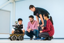 Second-year student Albert Go (left) says the NEET program is the best way to learn: “I like application and learning from my peers. With the projects, I’m excited to see what I’m learning about come to life.” From left: Albert Go, Mitchell Guillaume, Michael Everett, and Yu Liang (Gloria) Fang. 
