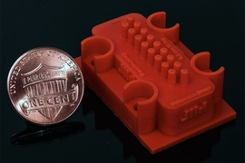A 3-D-printed manufacturing device can extrude fibers that are only 75 nanometers in diameter, or one-thousandth the width of a human hair.