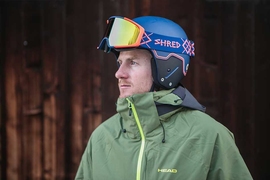 Ted Ligety wearing the helmet and goggle collection that Shred will be debuting at the Olympics. MIT students and faculty helped enhance the lens technology used in the lenses of these goggles.
