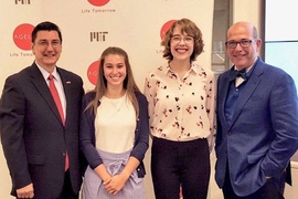 MIT AgeLab’s Joe Coughlin (right) and AARP’s Michael Festa (left) present OMEGA Scholarship awards to Rachel Schultz and Marley Belanger. Not pictured: Caroline Collins-Pisano. 