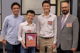 The Fiat Flux team earned the $10,000 first-place prize for its prototype of a self-cleaning water filtration system. Team members pose with Michael Tarkanian (right), a senior lecturer in the Department of Materials Science and Engineering (DMSE) who runs MADMEC. Team members pictured are: (from left to right) Gabriel Loke, Alvin Tan and Zheng Jie Tan.