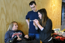 ATHack participants Borja Apaolaza and Naroa Coretti consult with co-designer Ellen.