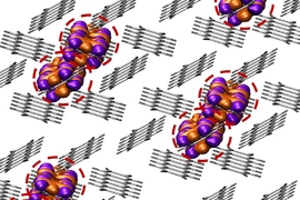 Diagram depicts the process of “singlet fission,” which is the first step toward producing two electrons from a single incoming photon of light.