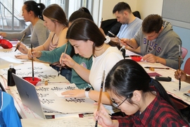 Kang Zhou, a lecturer in Chinese in MIT Global Studies and Languages, teaches the fundamentals of Chinese calligraphy during the MIT's Independent Activities Period in January.