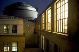 How can an institution like MIT grow, and simultaneously work to lessen its greenhouse gas emissions and contributions to climate change?