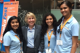  Leigh Estabrooks (second from left) stands with South Brunswick High School InvenTeam members at EurekaFest 2015.