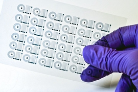 MIT researchers have 3-D-printed soft electronically active polymers into a number of devices, including a pliable neural electrode, and (shown here) a flexible circuit.