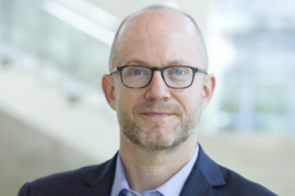 Portrait photo of Evan Lieberman