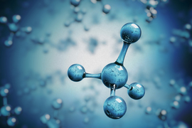 Close-up of molecule in front of other molecules