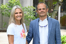 Flavia Cardarelli and Raul Radovitzky pose in front McCormick Hall