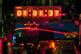 Photo of clock with glowing numbers